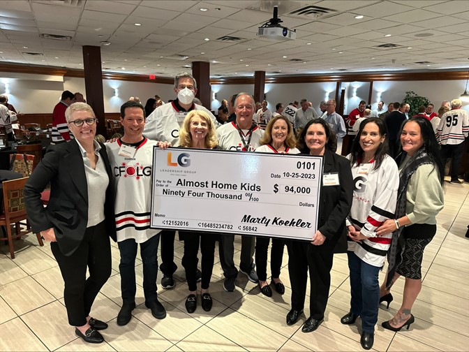 Leadership Group with Large Check