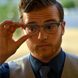 young man in glasses 