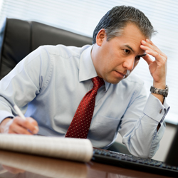 man appearing stressed out